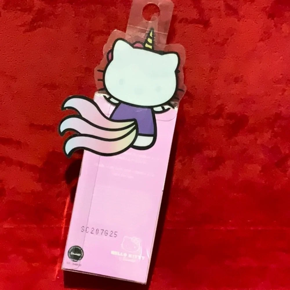 The Crème Shop x Hello Kitty rainbow sherbet Macaron Lip Balm